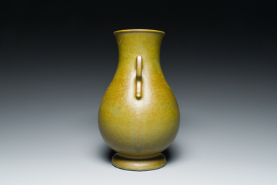 A Chinese monochrome teadust-glazed 'hu' vase, Qianlong mark, 19/20th C.
