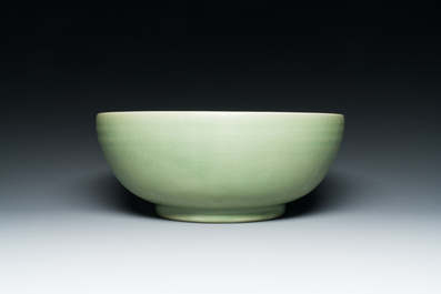 A Chinese Longquan celadon bowl with underglaze floral design, Ming