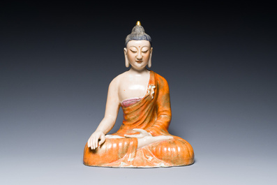 A Chinese famille rose figure of Buddha, Qianlong mark, 19/20th C.