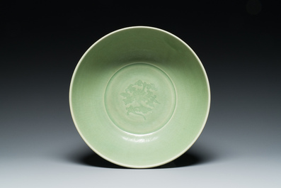 A Chinese Longquan celadon bowl with underglaze floral design, Ming