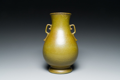 A Chinese monochrome teadust-glazed 'hu' vase, Qianlong mark, 19/20th C.