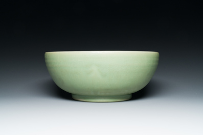 A Chinese Longquan celadon bowl with underglaze floral design, Ming