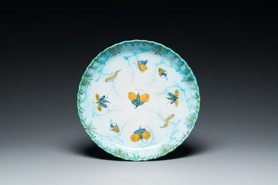 A polychrome Brussels faience 'caterpillars' tureen and cover on a 'butterfly' stand, 18th C.
