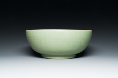 A Chinese Longquan celadon bowl with underglaze floral design, Ming