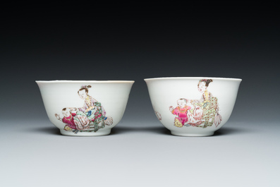 A pair of Chinese famille rose cups and saucers with a lady and a boy, Yongzheng
