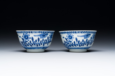 Nine Chinese blue and white 'Madonna and Child' saucers and two cups, Kangxi