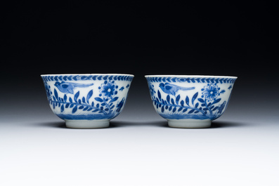 Nine Chinese blue and white 'Madonna and Child' saucers and two cups, Kangxi