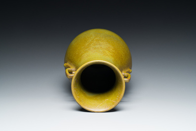 A Chinese monochrome teadust-glazed 'hu' vase, Qianlong mark, 19/20th C.