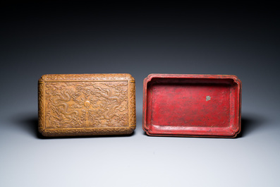 A Chinese rectangular huanghuali wooden box and cover with dragons, 17/18th C.
