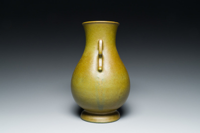 A Chinese monochrome teadust-glazed 'hu' vase, Qianlong mark, 19/20th C.