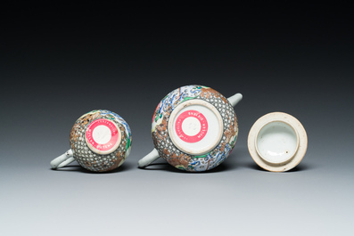 A Chinese famille rose 'pheasants' teapot and milk jug, Yongzheng