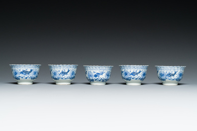 Ten Chinese blue, white, famille rose and Dutch-decorated cups and nine saucers, Kangxi and later