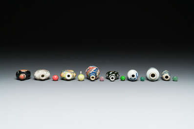 Eight Chinese blue and white, famille noire and famille rose snuff bottles, various marks, 19th C.