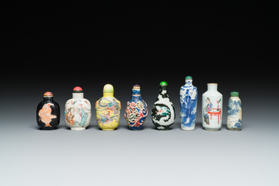 Eight Chinese blue and white, famille noire and famille rose snuff bottles, various marks, 19th C.