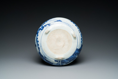 A Chinese blue and white tripod censer with figures in a mountainous landscape, Kangxi