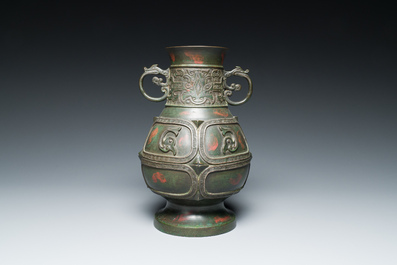 A Chinese gold and silver-inlaid bronze vase with pseudo-rust patina, 18th C.