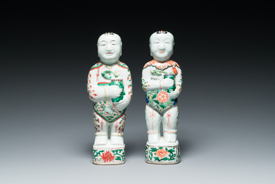 A pair of Chinese famille verte 'Hehe Er Xian' figures, Kangxi