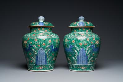 A pair of Chinese famille verte 'galloping horses' vases and covers, 19th C.