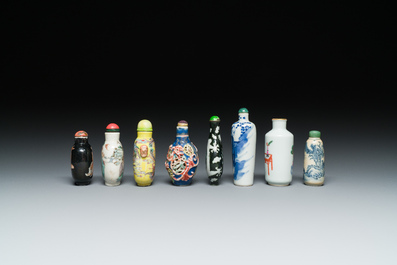 Eight Chinese blue and white, famille noire and famille rose snuff bottles, various marks, 19th C.