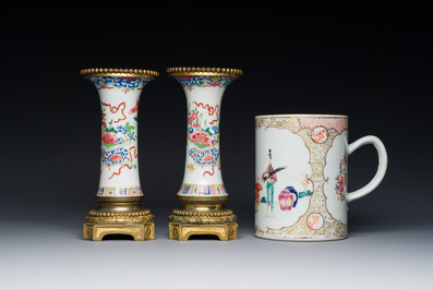 Une paire de vases en porcelaine de Chine famille rose aux montures en bronze dor&eacute; et une chope &agrave; sujet mandarin, Qianlong