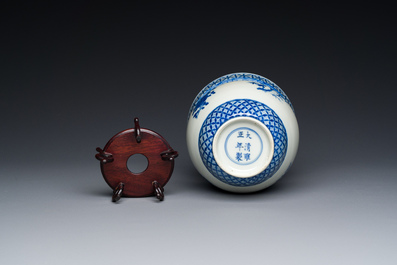 A Chinese blue and white basket-shaped vase on wooden stand, Yongzheng mark, 19/20th C.