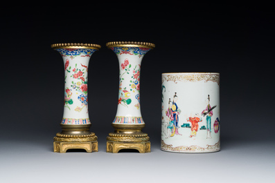 Une paire de vases en porcelaine de Chine famille rose aux montures en bronze dor&eacute; et une chope &agrave; sujet mandarin, Qianlong
