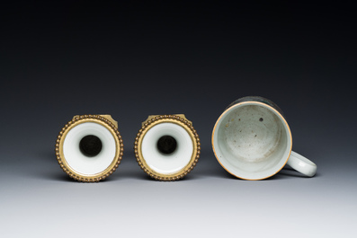 Une paire de vases en porcelaine de Chine famille rose aux montures en bronze dor&eacute; et une chope &agrave; sujet mandarin, Qianlong