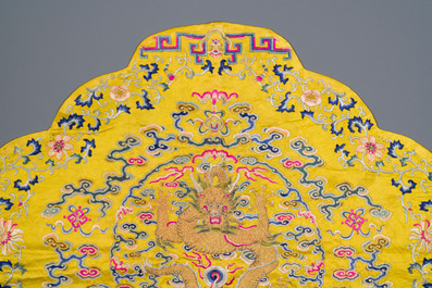 An imperial Chinese embroidered silk gold-thread yellow-ground cushion cover, 19th C.