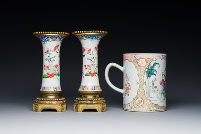 Une paire de vases en porcelaine de Chine famille rose aux montures en bronze dor&eacute; et une chope &agrave; sujet mandarin, Qianlong