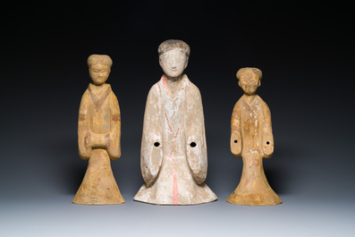 Three Chinese polychromed pottery figures of ladies, Han