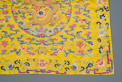 An imperial Chinese embroidered silk gold-thread yellow-ground cushion cover, 19th C.
