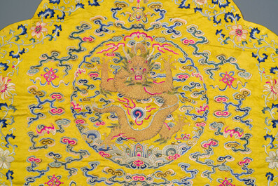 An imperial Chinese embroidered silk gold-thread yellow-ground cushion cover, 19th C.