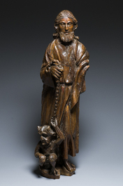 Een eikenhouten sculptuur van Lazarus als blinde geleid door de duivel, Frankrijk, 16e eeuw