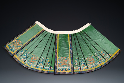 A Chinese embroidered silk 'dragon and phoenix' skirt and a wallet pouch, 18/19th C.