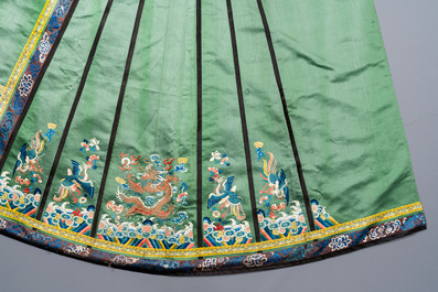 A Chinese embroidered silk 'dragon and phoenix' skirt and a wallet pouch, 18/19th C.