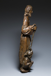 Een eikenhouten sculptuur van Lazarus als blinde geleid door de duivel, Frankrijk, 16e eeuw