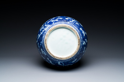 A Chinese blue and white double gourd 'prunus on cracked ice' vase, 18th C.