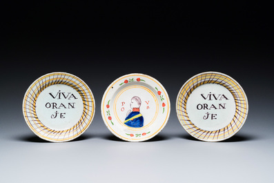 Three polychrome Dutch Delft 'orangist subject' plates, 18th C.