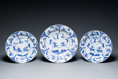 Three large deep Chinese blue and white 'hunting scene' dishes, Chenghua mark, Kangxi