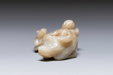 A Chinese jade 'boy on a buffalo' group, Qing