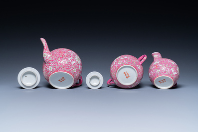 A Chinese 15-piece tea service with lotus scrolls on a purple ground, Guangxu mark, 20th C.
