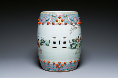 A Chinese famille rose garden seat with ladies in a garden, 20th C.