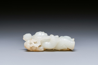 A Chinese white and russet jade sculpture of two boys, Qing