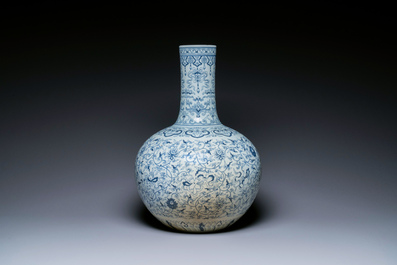 A large Chinese blue and white bottle vase, Qianlong mark, 19/20th C.