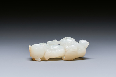 A Chinese white and russet jade sculpture of two boys, Qing