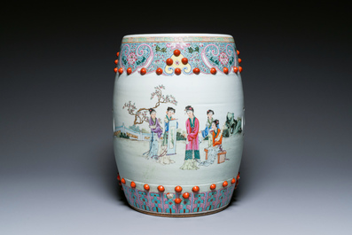 A Chinese famille rose garden seat with ladies in a garden, 20th C.