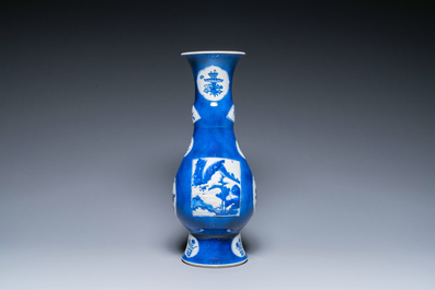 Een Chinese poederblauwe flesvormige vaas met landschapspanelen, Kangxi