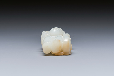 A Chinese white and russet jade sculpture of two boys, Qing