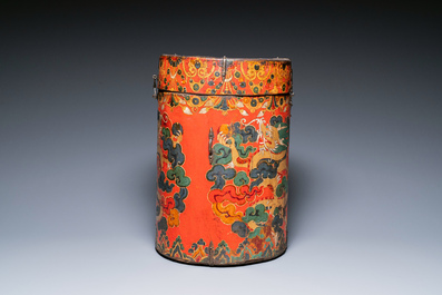 A large leather-clad wooden box and cover painted with dragons on a red ground, Tibet, 17/18th C.