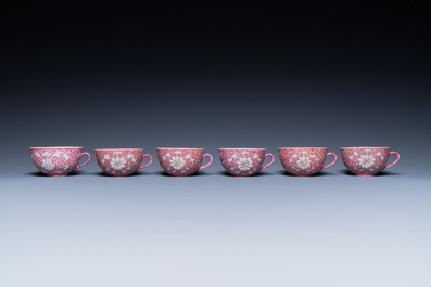 A Chinese 15-piece tea service with lotus scrolls on a purple ground, Guangxu mark, 20th C.